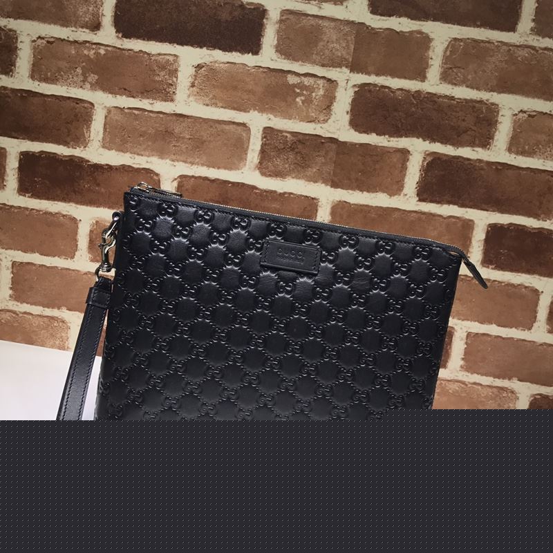 G*u*i clutch bags